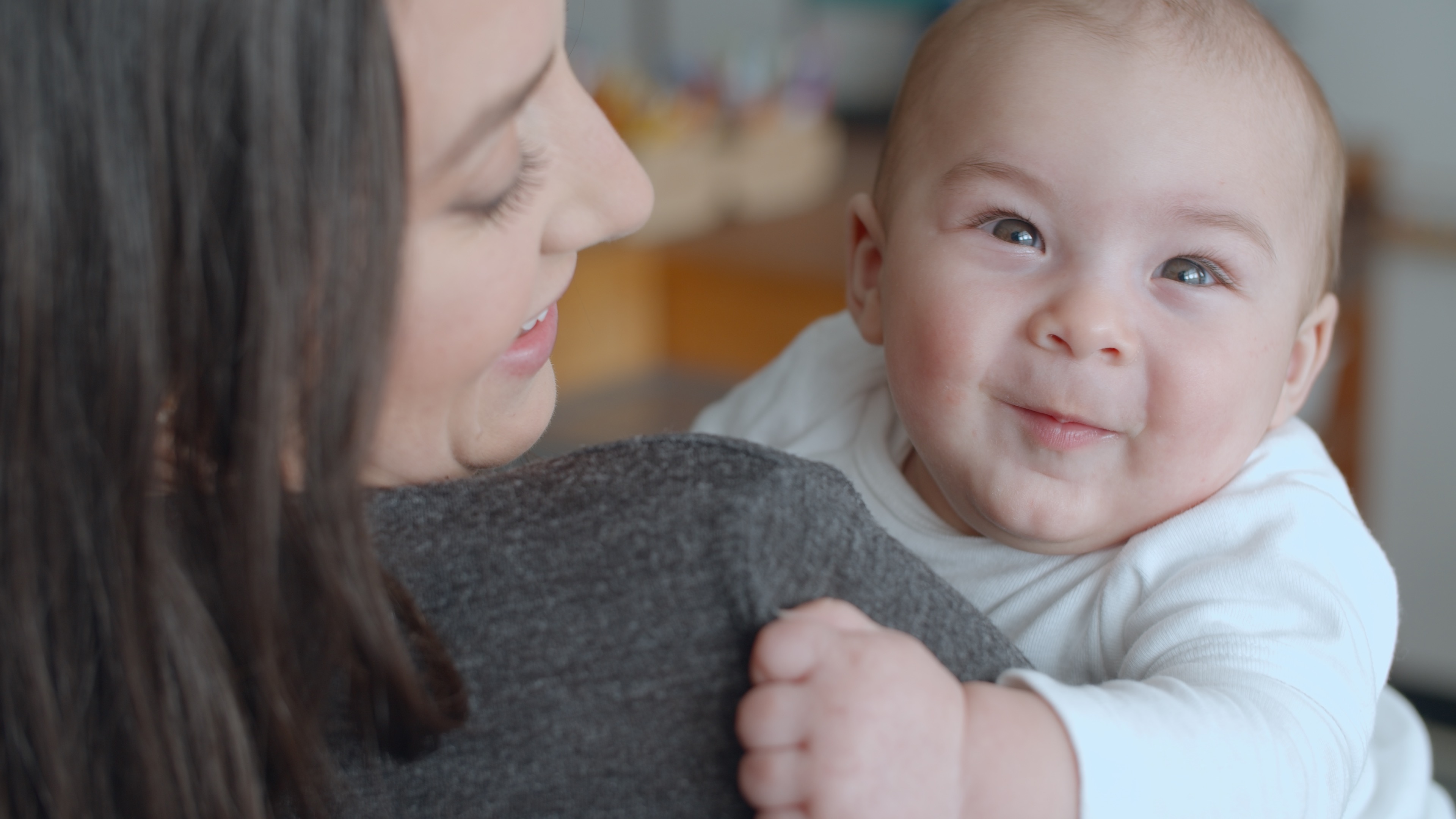 happy baby and mother
